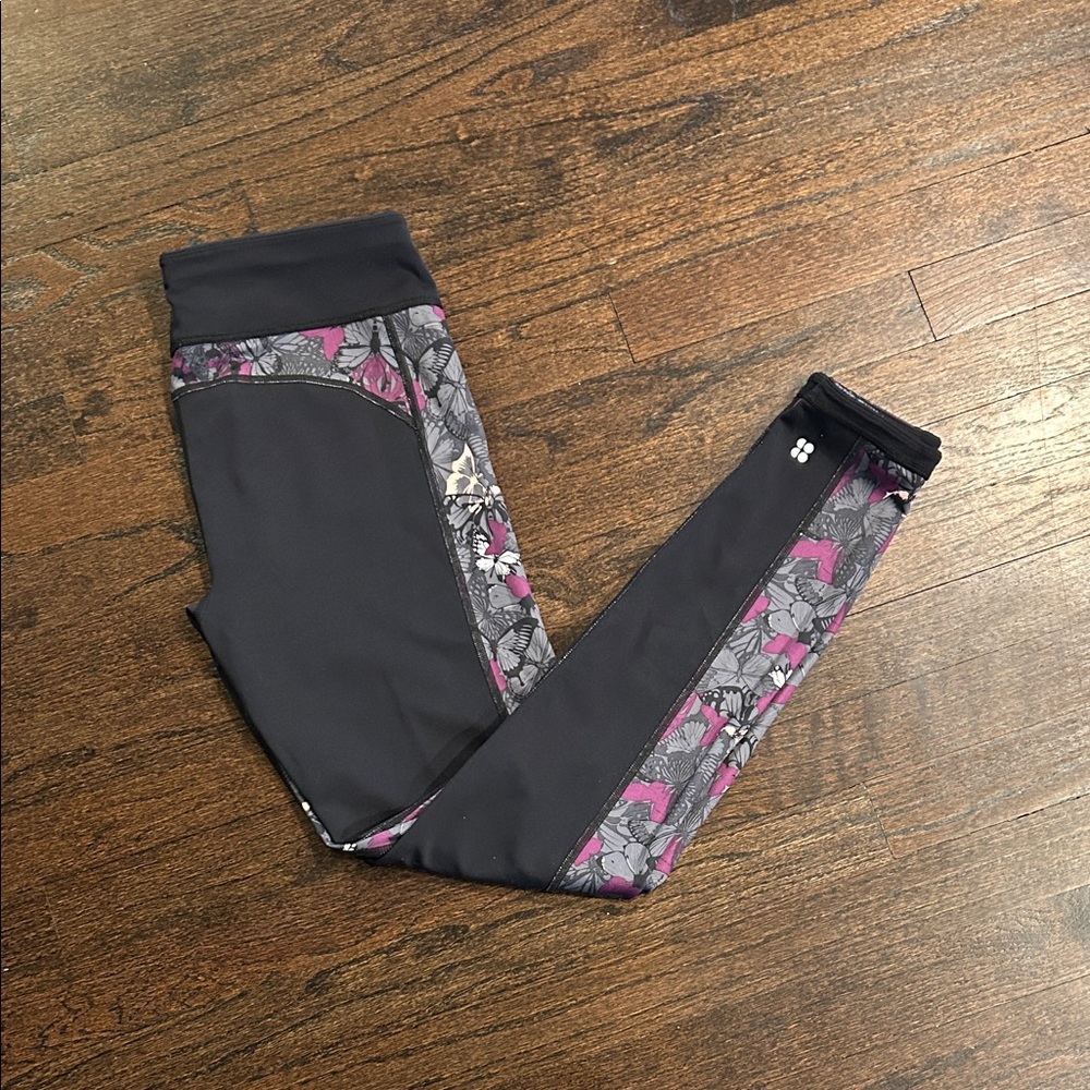 NWT Sweaty Betty Women’s Leggings with Pink and Gray Butterly Design Size Medium